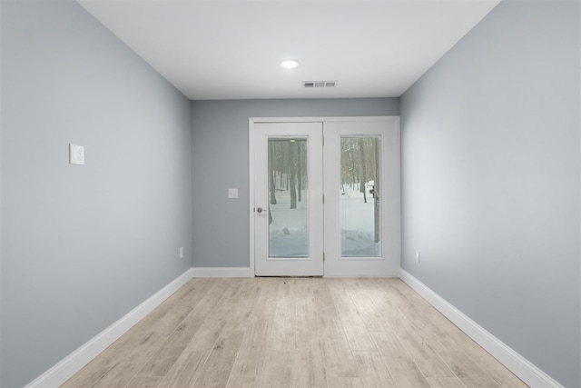 doorway featuring light hardwood / wood-style floors