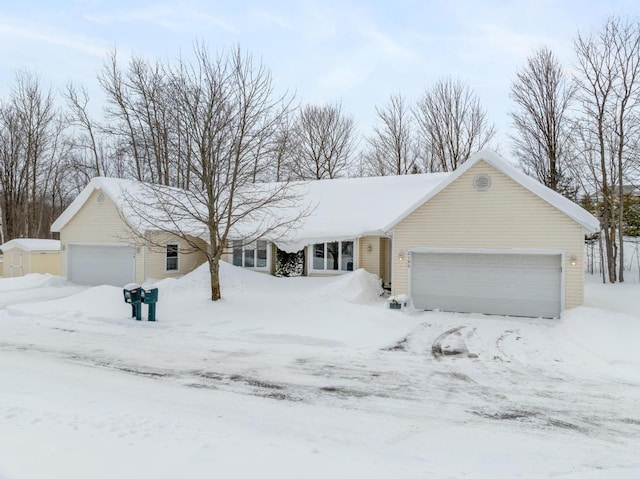 single story home featuring a garage