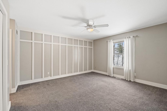 unfurnished room featuring ceiling fan and carpet flooring