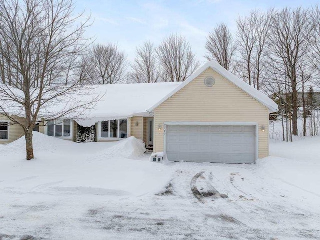 ranch-style house with a garage