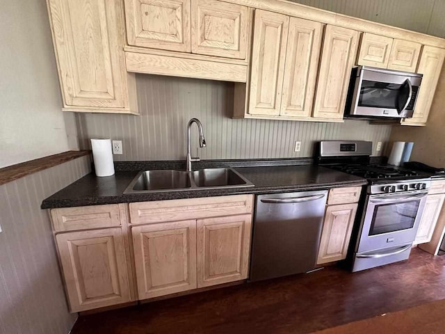 kitchen with appliances with stainless steel finishes and sink