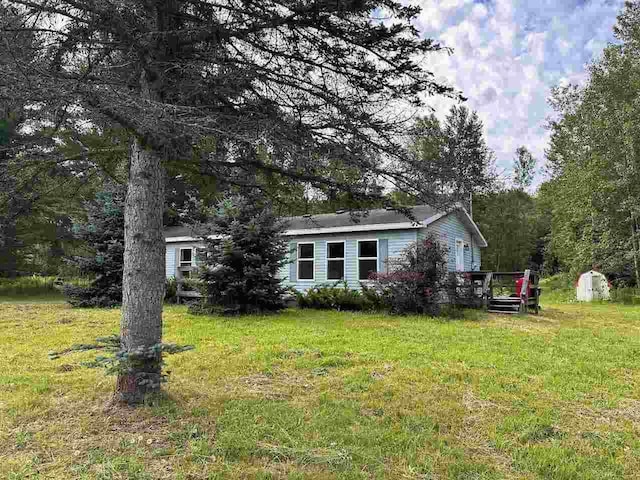 view of yard with a deck