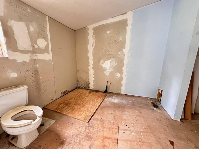 bathroom featuring toilet