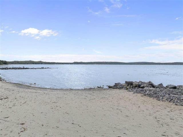 property view of water featuring a view of the beach