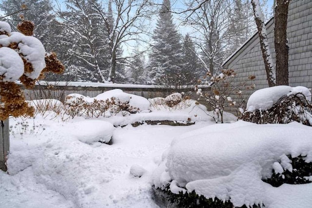 view of yard covered in snow