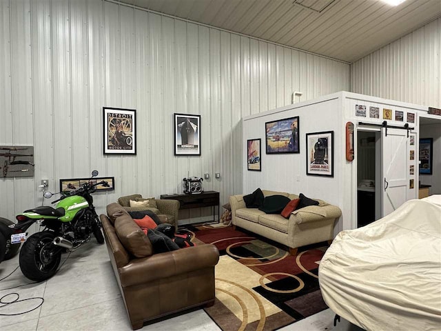 living room featuring a barn door