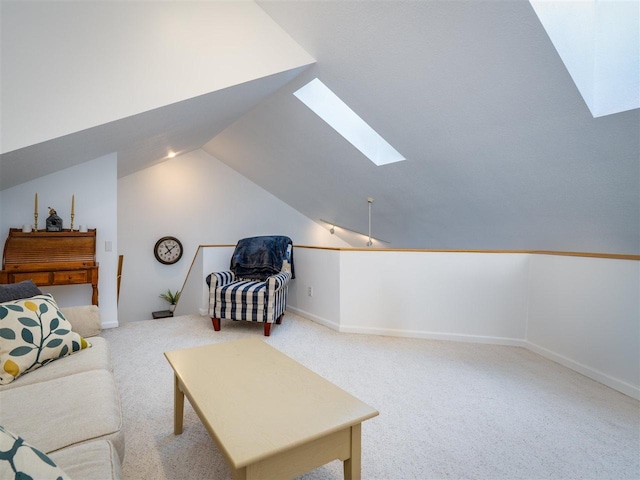 interior space with vaulted ceiling with skylight