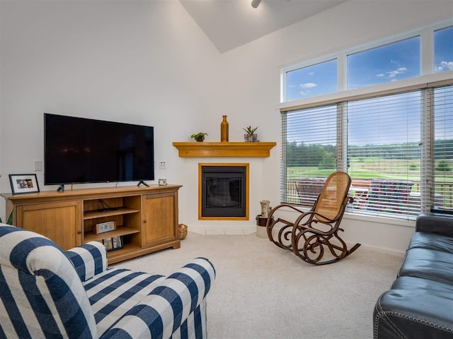 living room with carpet and lofted ceiling