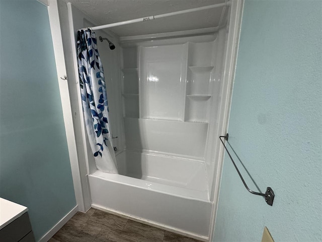 bathroom with vanity and shower / bathtub combination with curtain