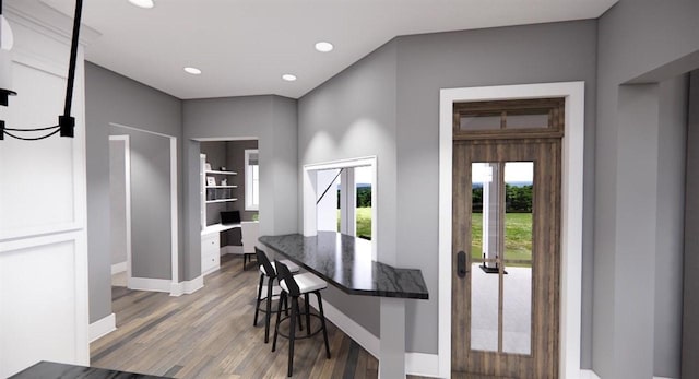 kitchen with hardwood / wood-style flooring