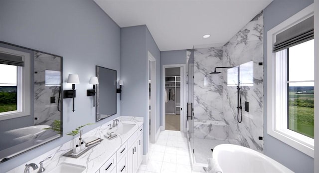 bathroom with vanity and independent shower and bath