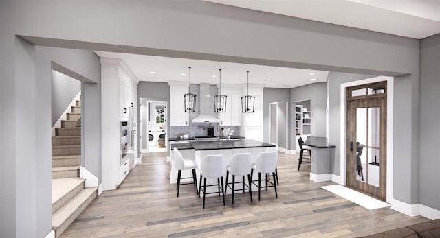 dining space featuring light hardwood / wood-style flooring