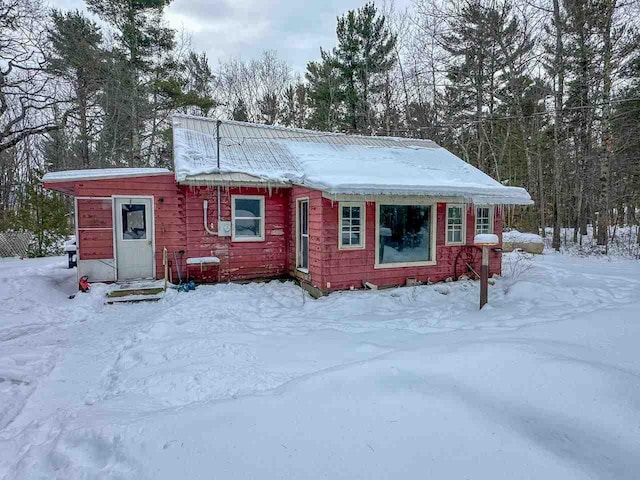 view of snow covered property