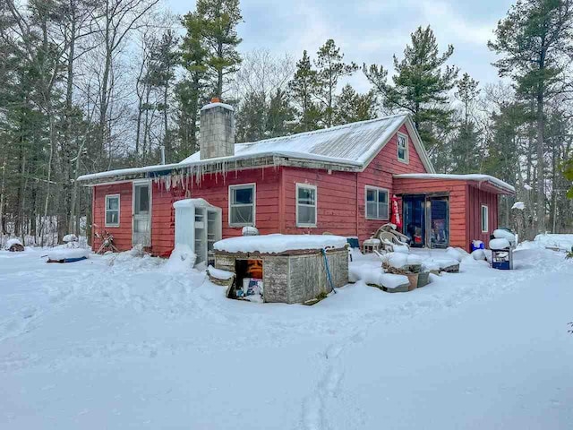 view of snow covered property