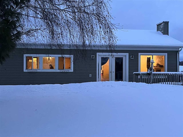 view of snow covered property