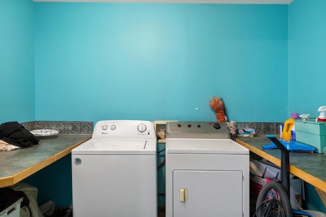 laundry area featuring washing machine and dryer