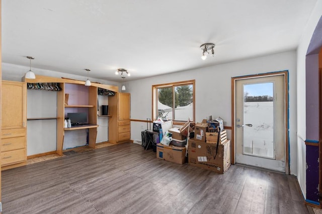 miscellaneous room with dark hardwood / wood-style flooring