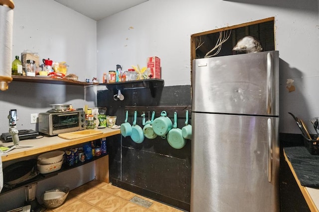 kitchen with stainless steel refrigerator