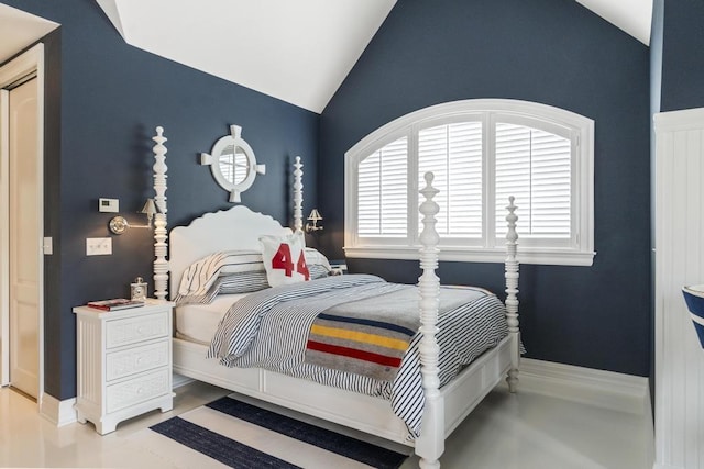 bedroom featuring lofted ceiling