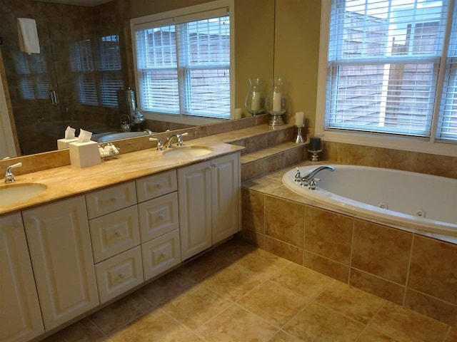 bathroom with vanity, separate shower and tub, and tile patterned floors