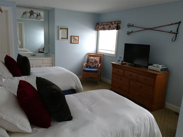 bedroom with light carpet