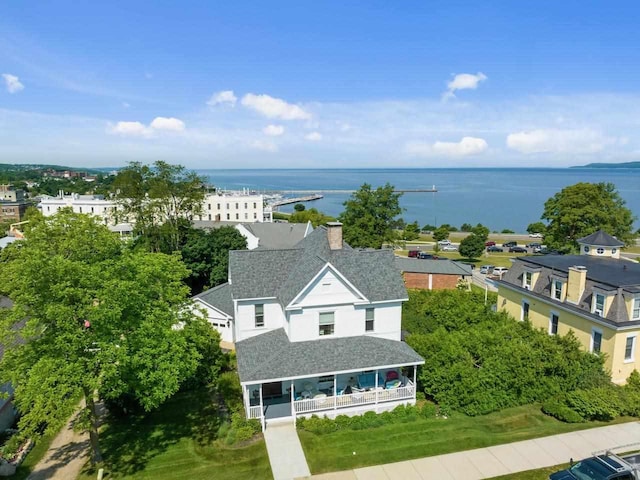 drone / aerial view with a water view