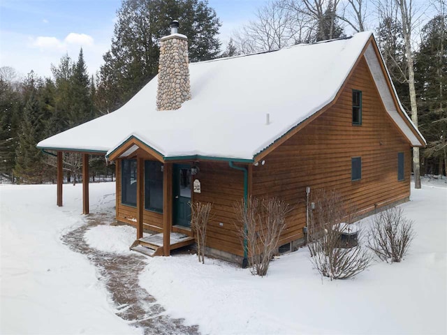 view of snow covered property