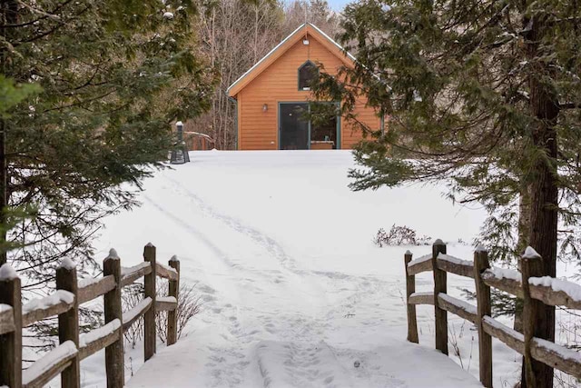 view of yard layered in snow