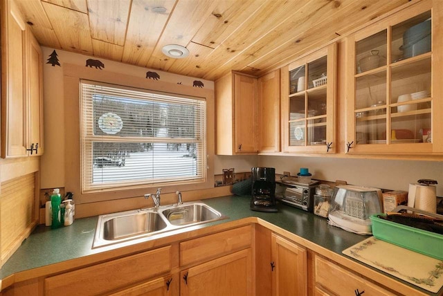 kitchen featuring light brown cabinetry, sink, and wooden ceiling