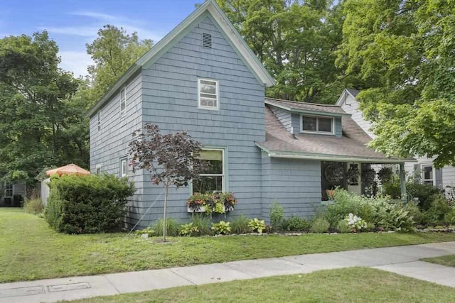 view of property exterior featuring a yard