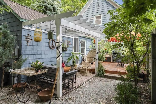 view of patio / terrace with a pergola and a deck