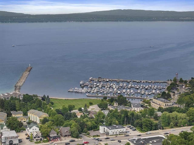 birds eye view of property featuring a water view