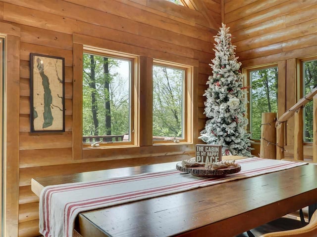 unfurnished sunroom with plenty of natural light