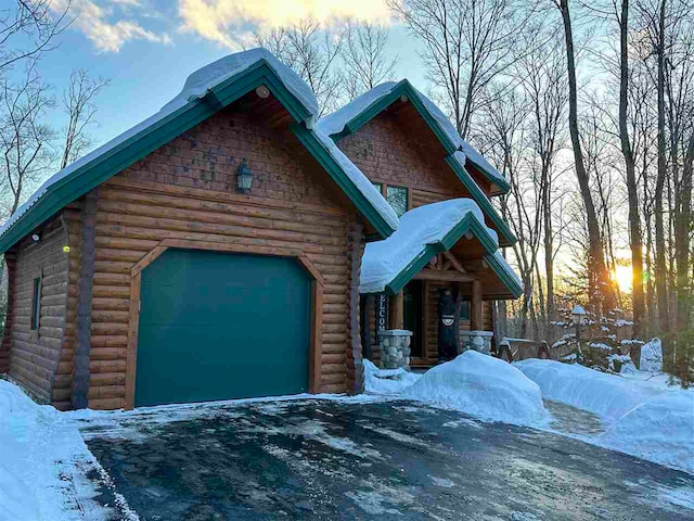 cabin featuring a garage