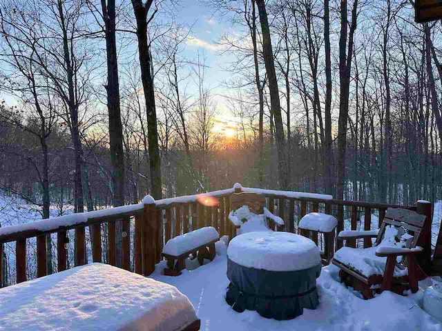 view of snow covered deck