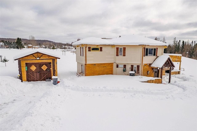 view of snow covered property