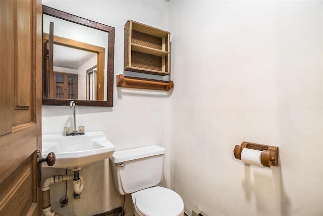 bathroom with sink and toilet