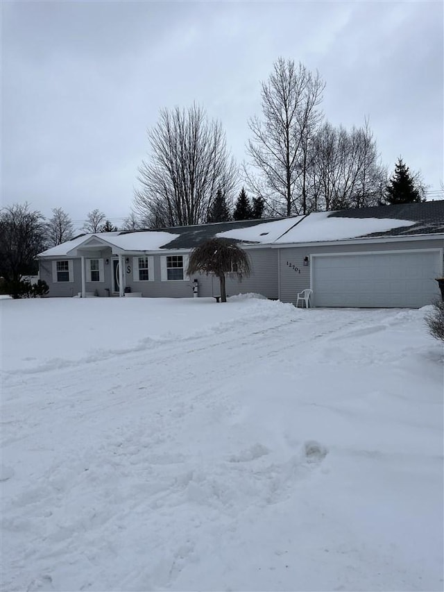 single story home with a garage