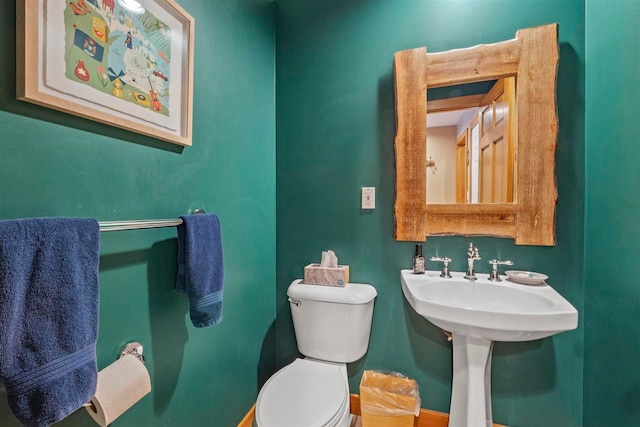 bathroom featuring toilet