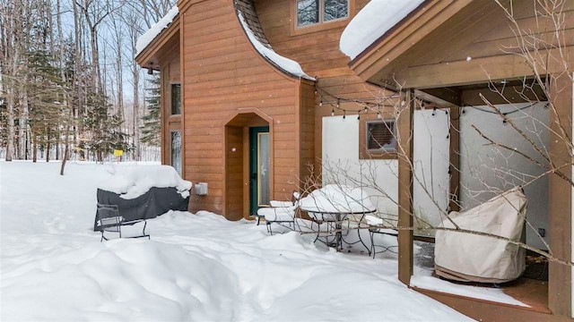 view of snow covered property