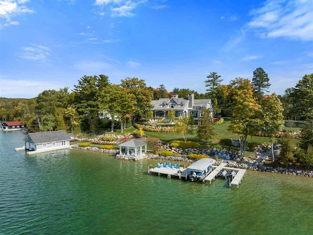 dock area with a gazebo and a water view