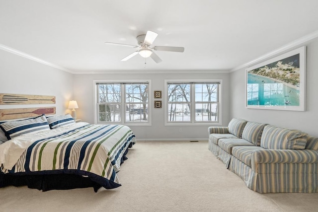 bedroom with baseboards, ornamental molding, light colored carpet, and ceiling fan