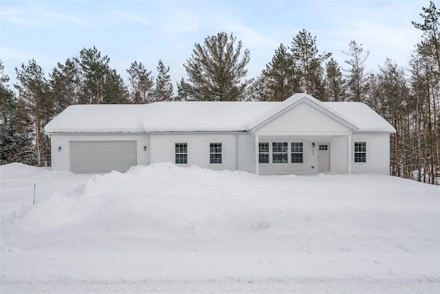 ranch-style house featuring a garage