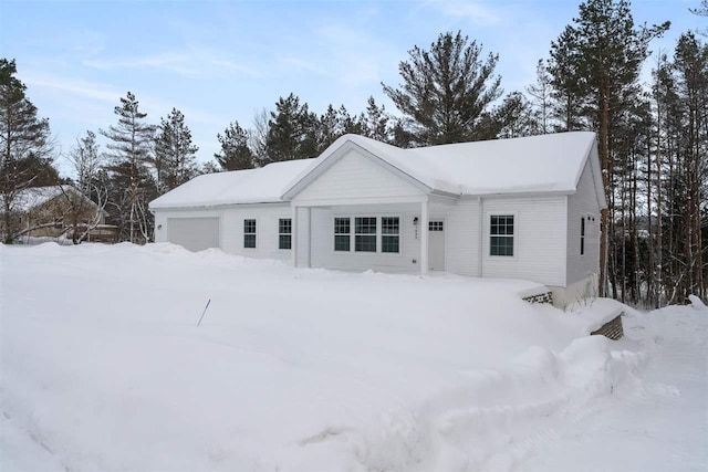 view of front of property featuring a garage