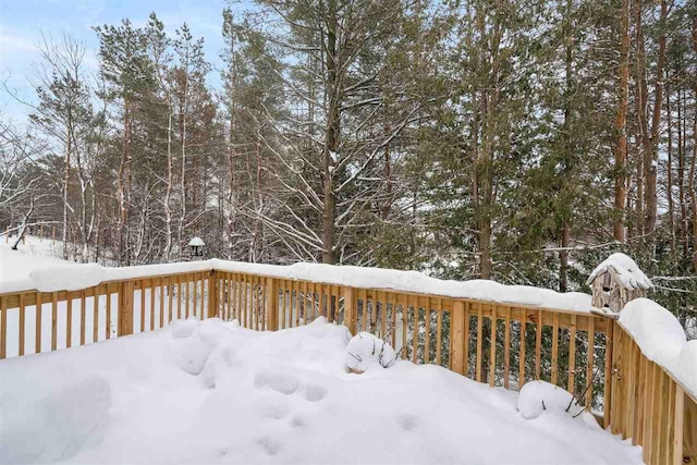 view of snow covered deck