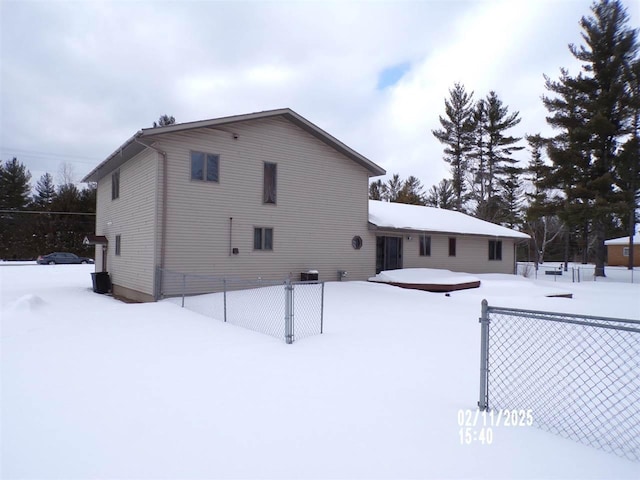 view of snow covered house