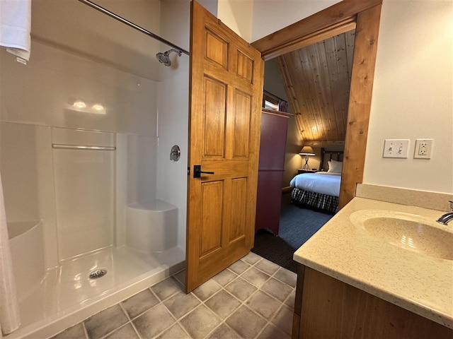 bathroom with walk in shower, tile patterned floors, vaulted ceiling, wooden ceiling, and vanity