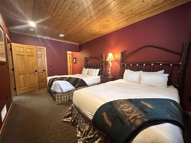 bedroom featuring wood ceiling, carpet flooring, and crown molding