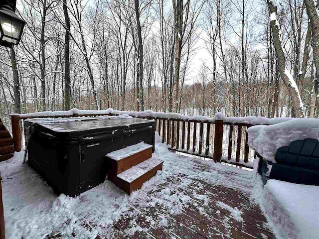 view of snow covered deck