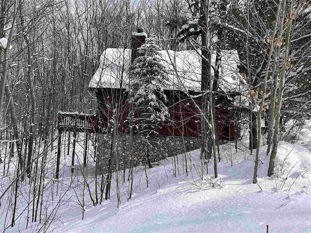 view of snow covered property